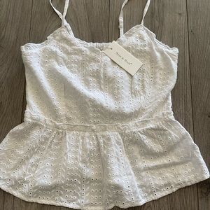 White flowy top